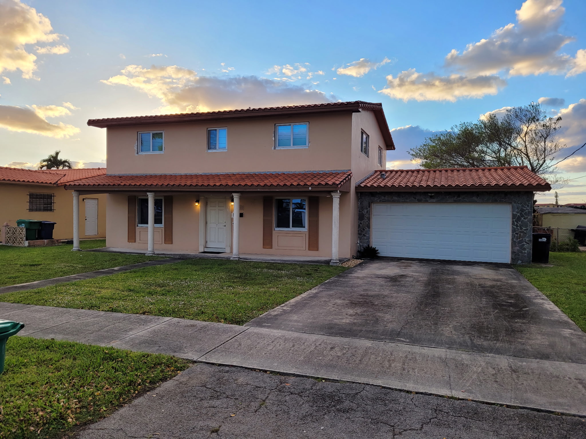 Beautiful two-story South Florida home at sunset